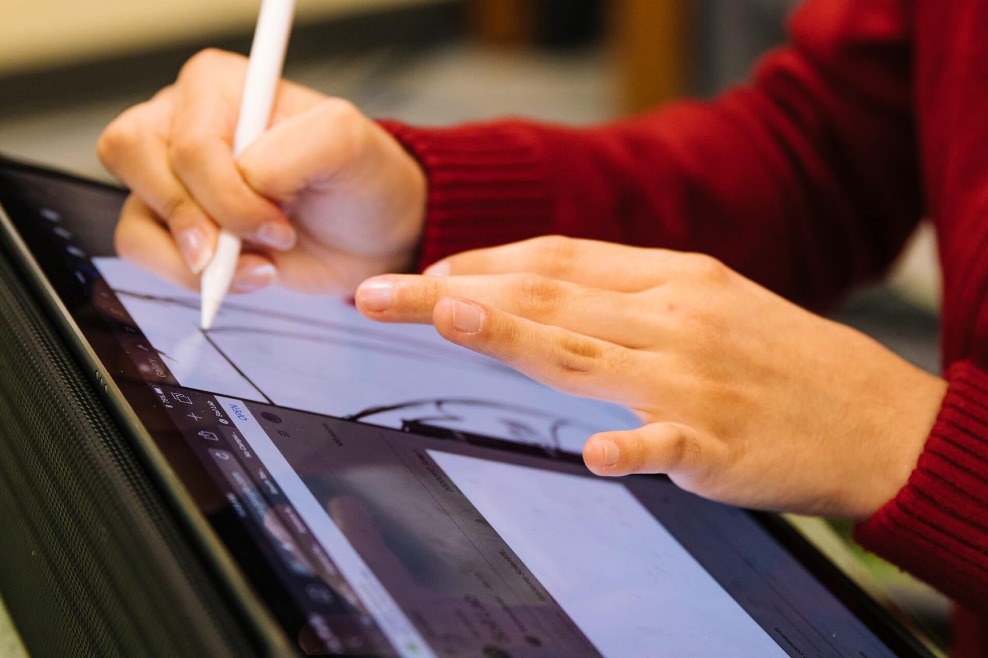 an outsourced software designer drawing a UI